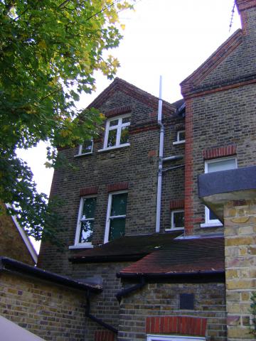 Floor plans and elevations of a house in Strawberry Hill