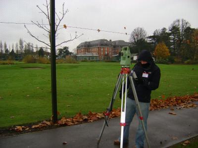 land surveyor at a sports complex